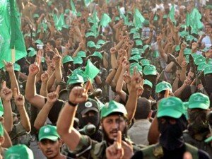 Hamas members demonstrate in the West Bank