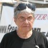 Holocaust survivor Hedy Epstein, wearing a t-shirt with the Arabic slogan 'Gaza on my mind' encircled with a drawing of barbed wire, poses in front of one of the peace boats docked at the southern Cypriot port of Larnaca on their way to the Gaza Strip on August 21, 2008. Two converted fishing boats carrying 40-odd activists are due to set sail from Cyprus tomorrow for the 370 kilometre (230 mile) sea voyage to Gaza in a bid to break the Israeli blockade. AFP PHOTO/STEFANOS KOURATZIS (Photo credit should read STEFANOS KOURATZIS/AFP/Getty Images)